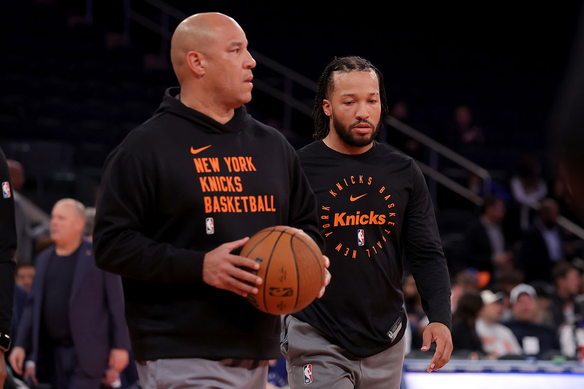 Nov 15, 2024; New York, New York, USA; New York Knicks guard Jalen Brunson (11) warms up with father and coach Rick Brunson before a game against the Brooklyn Nets at Madison Square Garden. Mandatory Credit: Brad Penner-Imagn Images