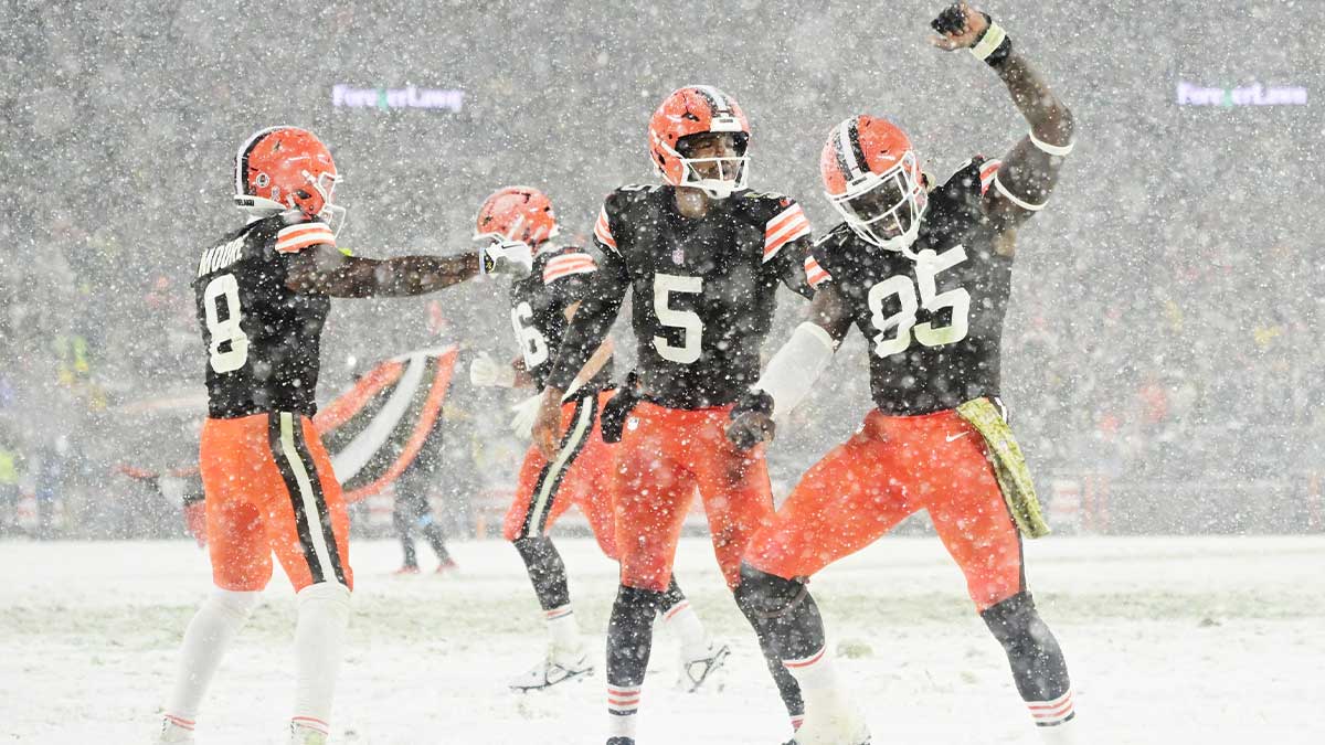 Cleveland Browns wide receiver Elijah Moore (8) and quarterback Jameis Winston (5) and tight end David Njoku (85) celebrate after Winston scored a touchdown during the second half against the Pittsburgh Steelers at Huntington Bank Field.