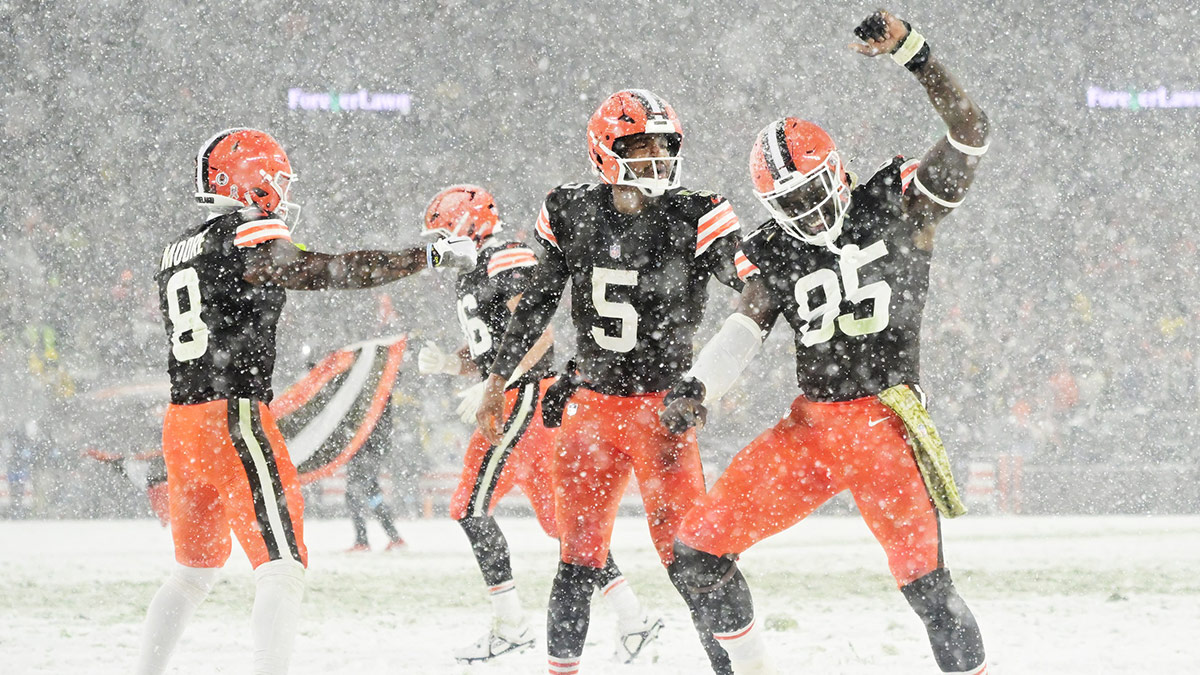 Cleveland Browns wide receiver Elijah Moore (8) and quarterback Jameis Winston (5) and tight end David Njoku (85) celebrate after Winston scored a touchdown during the second half against the Pittsburgh Steelers at Huntington Bank Field.