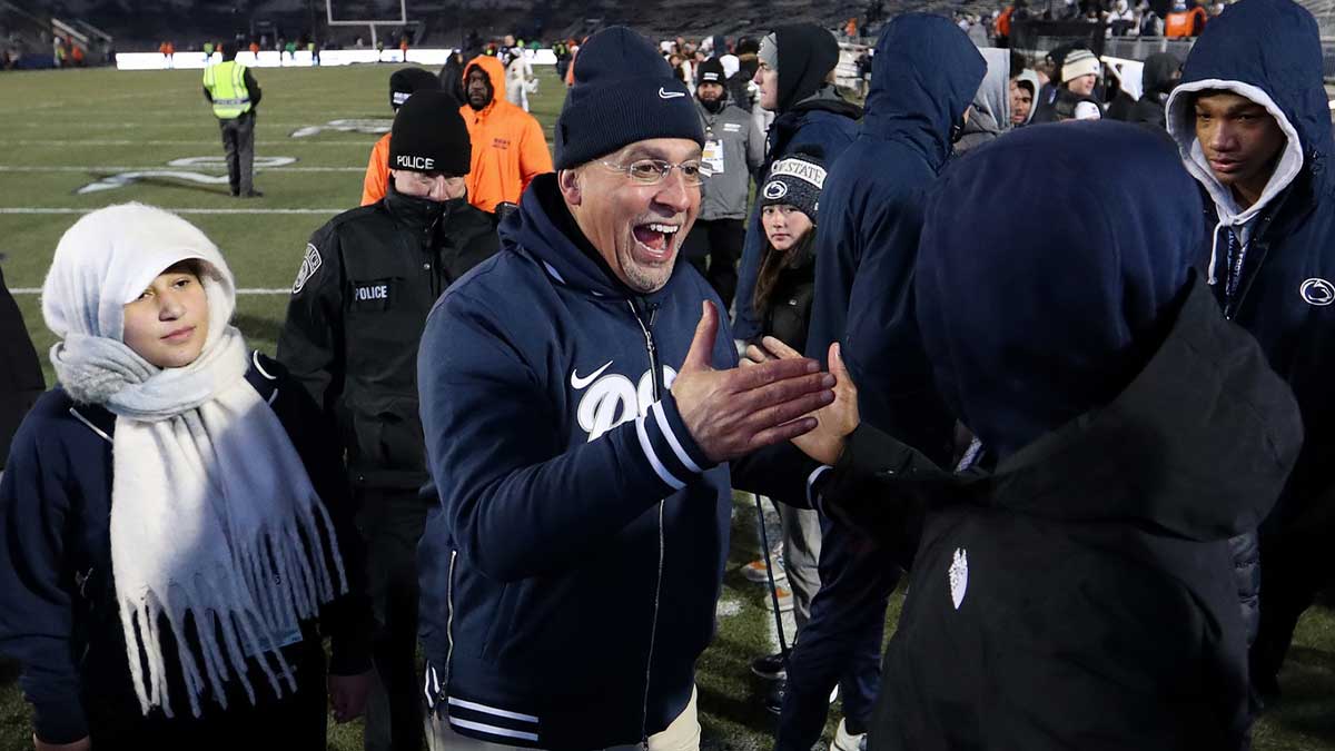 Penn State Nittany Lions head coach James Franklin shakes the hand of a recruit following a game against the Maryland Terrapins at Beaver Stadium. Penn State won 44-7.