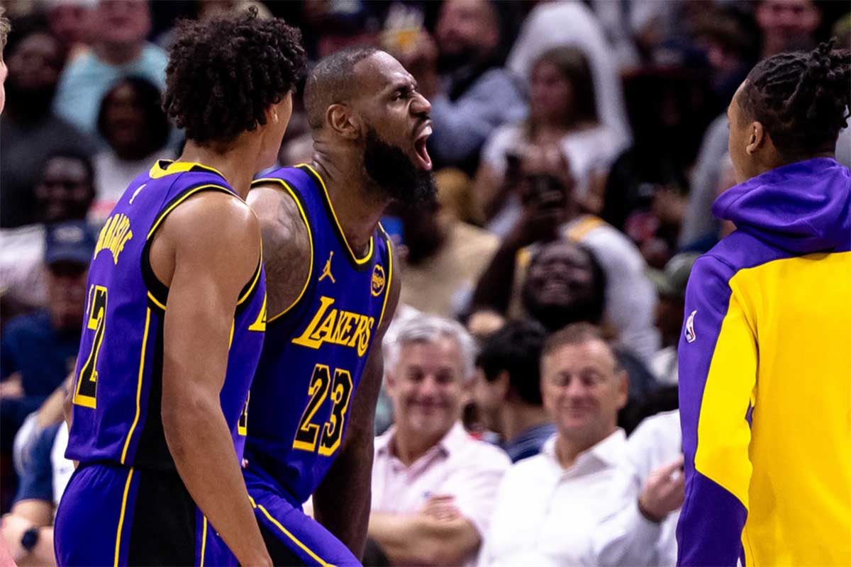 ; Los Angeles Lakers forward LeBron James (23) reacts to making a three point basket against the New Orleans Pelicans during the second half at Smoothie King Center.