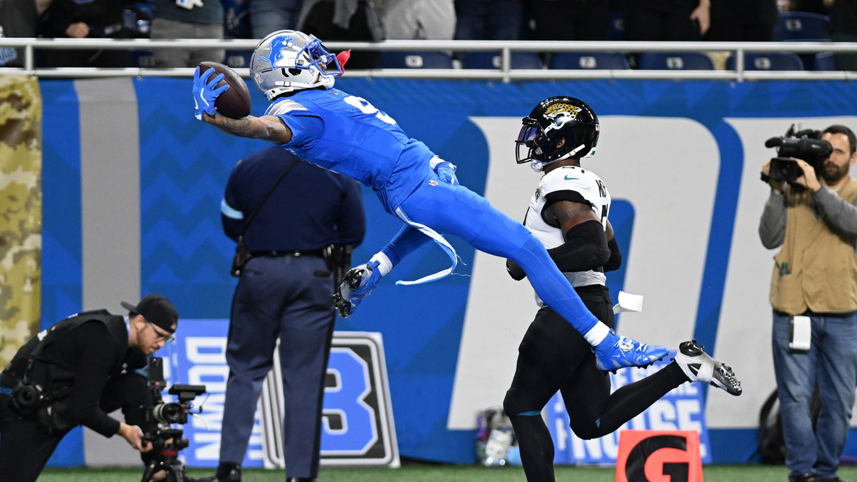 Detroit Lions wide receiver Jameson Williams (9) runs into the end zone for a 64-yard touchdown catch against the Jacksonville Jaguars in the third quarter at Ford Field.