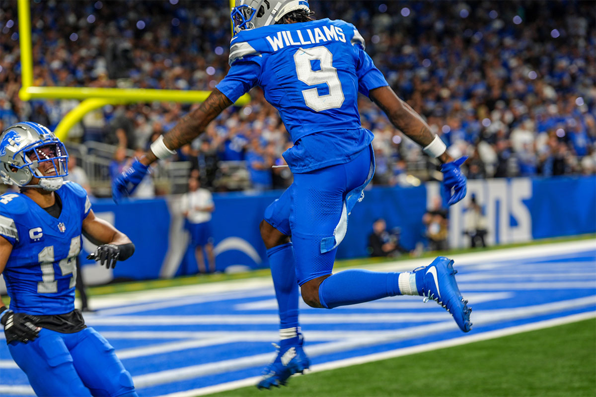 Detroit Lions wide receiver Jameson Williams (9) celebrates a touchdown with Detroit Lions wide receiver Amon-Ra St. Brown (14) in the second half of the Detroit Lions season opener against the Los Angeles Rams at Ford Field in Detroit, on Sunday, Sept. 8. 2024.