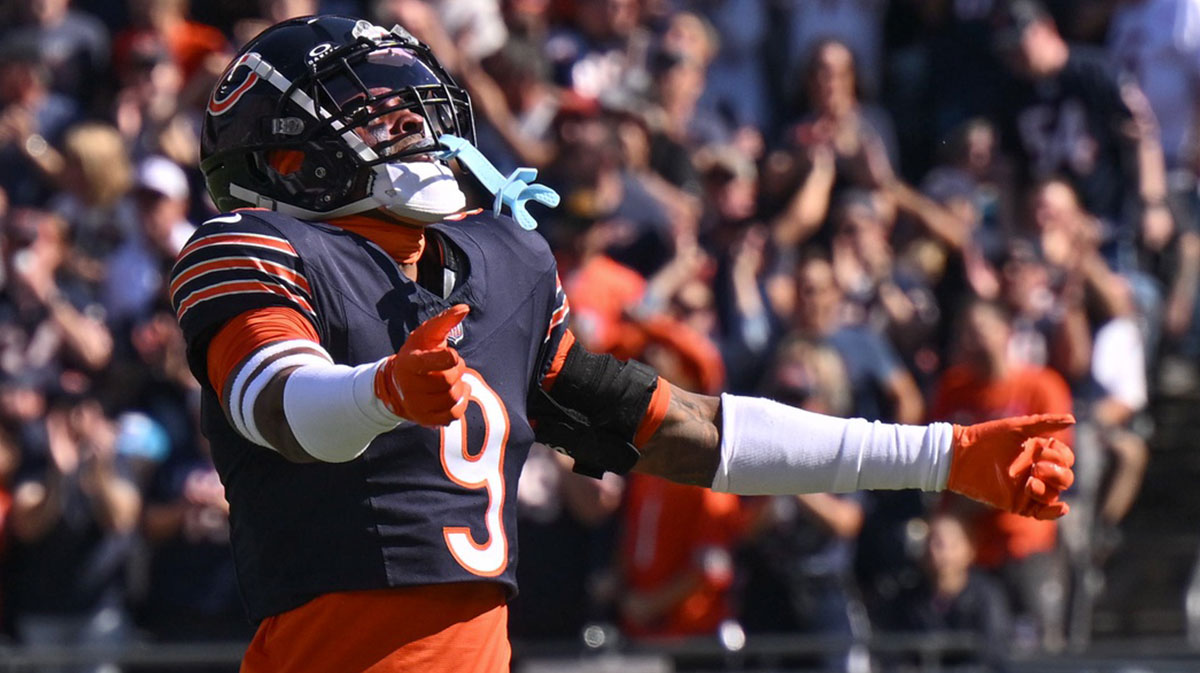 Chicago Bears safety Jaquan Brisker (9) celebrates a defensive stop against the Carolina Panthers during the first quarter at Soldier Field.
