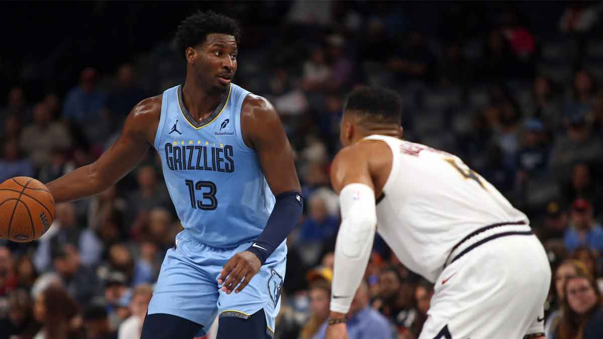 Memphis Grizzlies forward Jaren Jackson Jr. (13) dribbles during the second half against the Denver Nuggets at FedExForum.