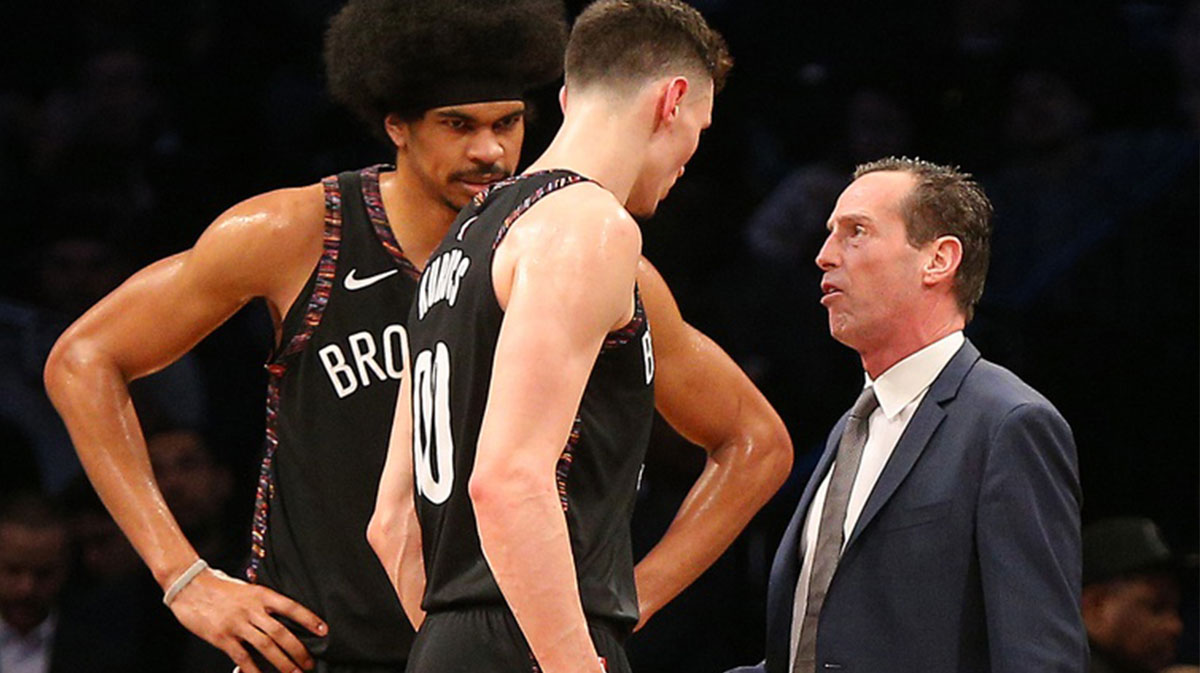 Mar 11, 2019; Brooklyn, NY, USA;Brooklyn Nets head coach Kenny Atkinson talks with Brooklyn Nets forward Rodions Kurucs (00) and center Jarrett Allen (31)during the first half at Barclays Center. Mandatory Credit: Andy Marlin-Imagn Images