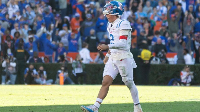 Mississippi Rebels quarterback Jaxson Dart (2) walks off the field after throwing an interception against the Florida Gators during the second half at Ben Hill Griffin Stadium.