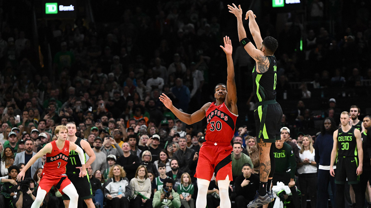 Boston Celtics forward Jayson Tatum (0) makes the game winning basket in overtime against the Toronto Raptors at the TD Garden.