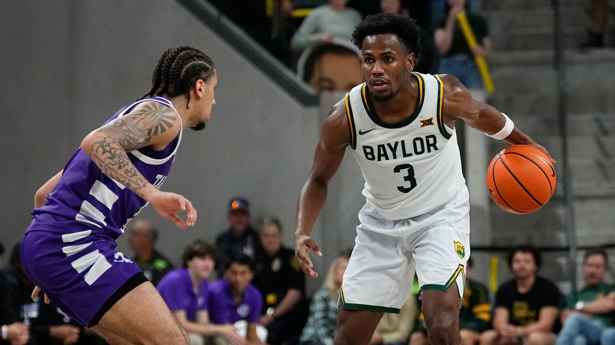 Baylor Bears guard Jeremy Roach (3) dribbles the ball up court as Tarleton Texans guard Izzy Miles (0) defends during the second half at Paul and Alejandra Foster Pavilion