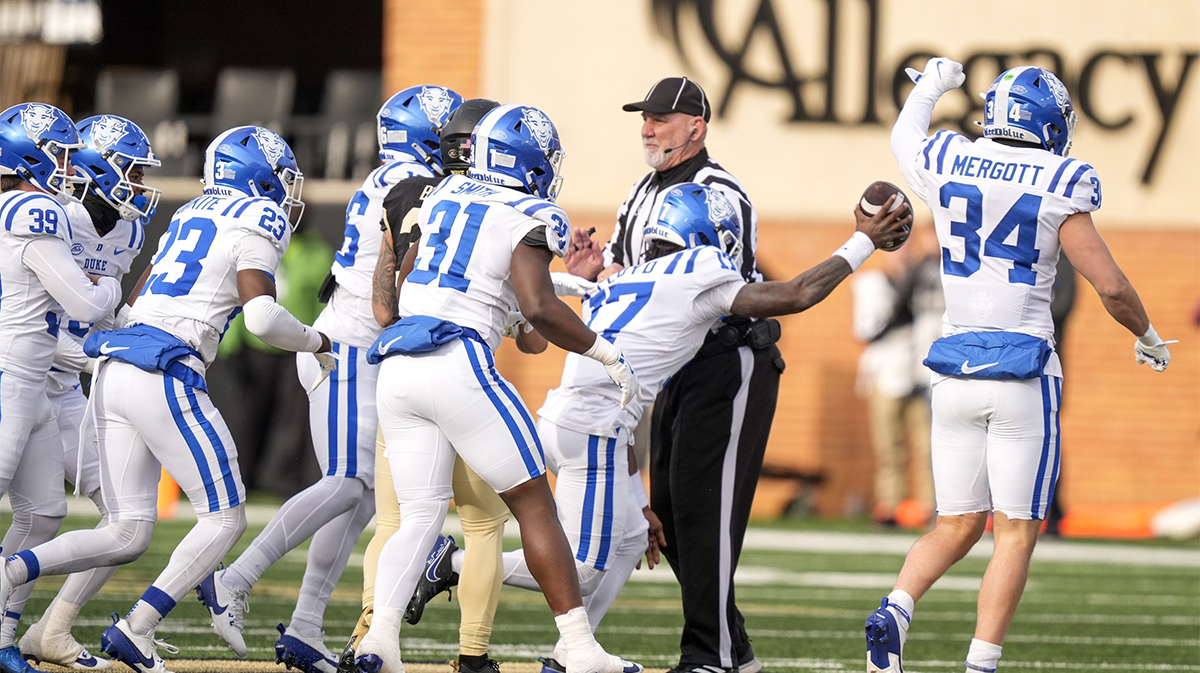 Duke Blue Devils cornerback Vontae Floyd (17) and defensive end Tyshon Reed (10) celebrate his fumble recovery against the Wake Forest Demon Deacons during the second half at Allegacy Federal Credit Union Stadium.