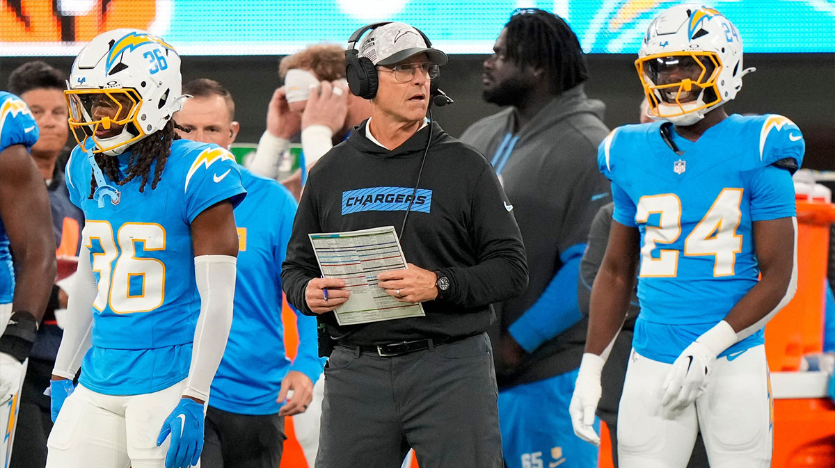Los Angeles Chargers head coach Jim Harbaugh challenges a call in the first quarter of the NFL Week 11 game between the Los Angeles Chargers and the Cincinnati Bengals at SoFi Stadium in Inglewood, Calif., on Sunday, Nov. 17, 2024. The Chargers led 24-6 at halftime. Sam Greene/The Enquirer / USA TODAY NETWORK via Imagn Images