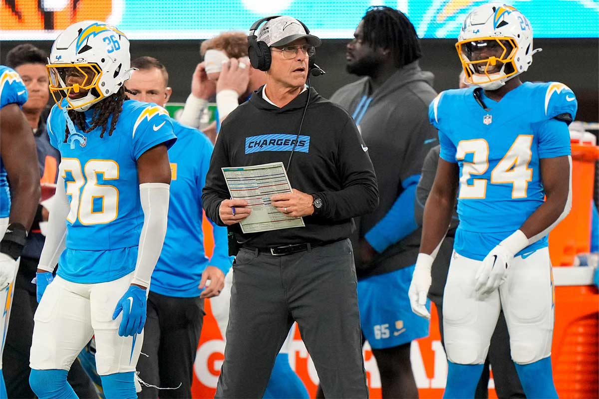 Los Angeles Chargers head coach Jim Harbaugh challenges a call in the first quarter of the NFL Week 11 game between the Los Angeles Chargers and the Cincinnati Bengals at SoFi Stadium in Inglewood, Calif., on Sunday, Nov. 17, 2024. The Chargers led 24-6 at halftime.