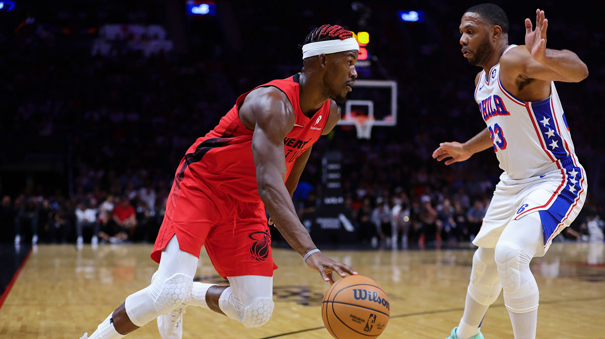 Miami Heat forward Jimmy Butler (22) drives to the basket against Philadelphia 76ers guard Eric Gordon (23) during the second quarter at Kaseya Center