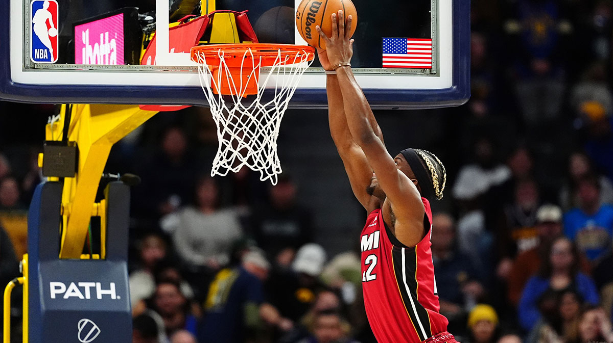  Miami Heat forward Jimmy Butler (22) shoots in the first quarter against the Denver Nuggets at Ball Arena. 