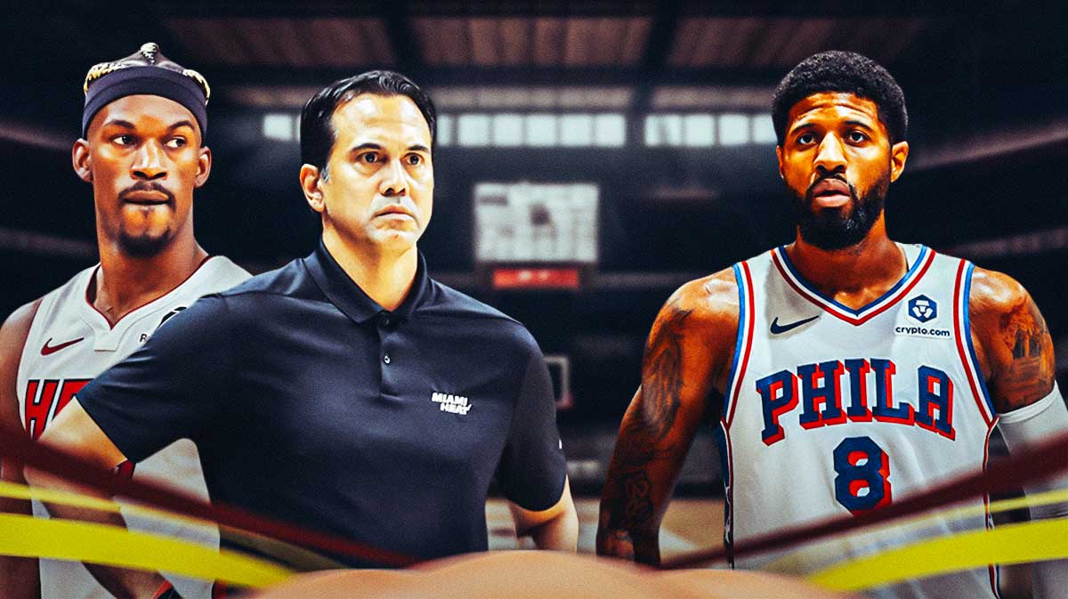 Heat Jimmy Butler and Heat Erik Spoelstra with 76ers Paul George in the background