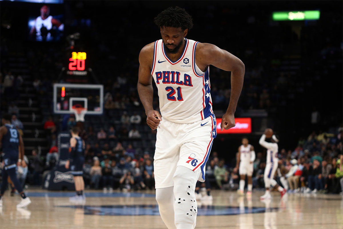 Philadelphia 76ers center Joel Embiid (21) limps to the bench during a time out during the second half against the Memphis Grizzlies at FedExForum.