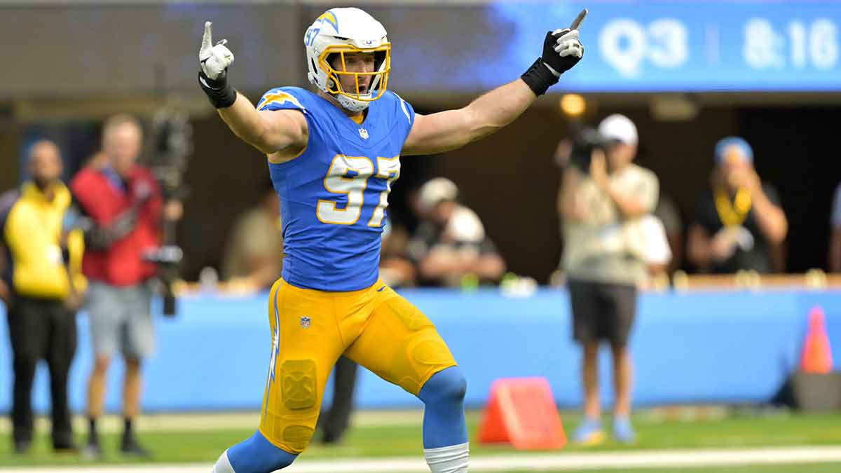 Los Angeles Chargers linebacker Joey Bosa (97) celebrates after forcing a fumble in the second half against the Las Vegas Raiders at SoFi Stadium.