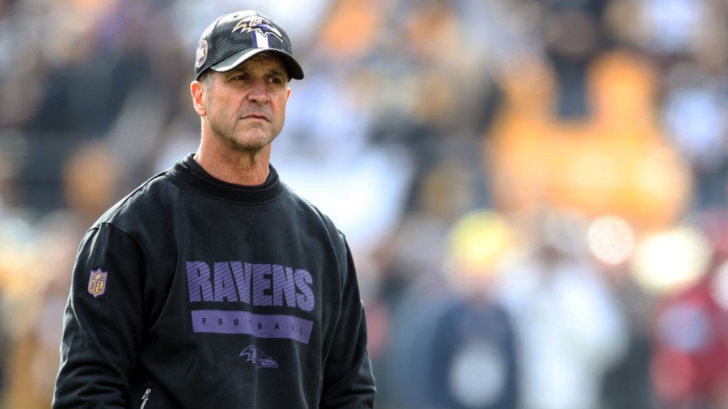 Baltimore Ravens head coach John Harbaugh watches warm ups against the Pittsburgh Steelers at Acrisure Stadium.