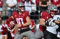 Washington State Cougars quarterback John Mateer (10) throws a pass against the Hawaii Warriors in the first half at Gesa Field at Martin Stadium.