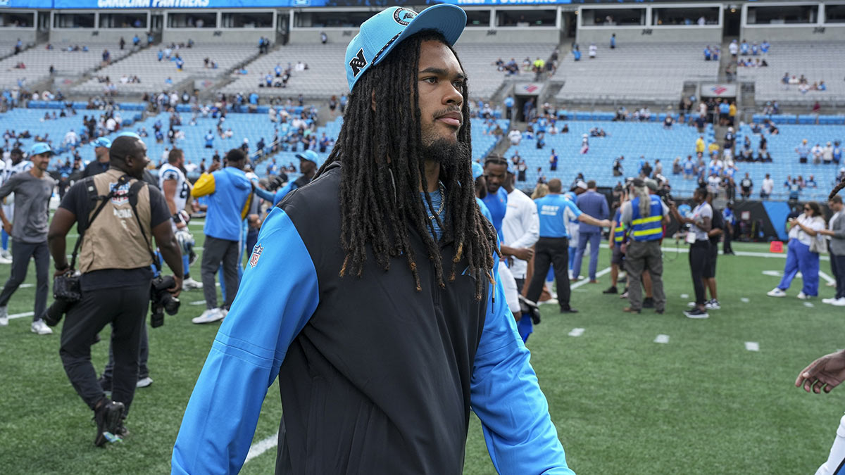 Carolina Panthers running back Jonathon Brooks (24) walks off the field after the second half against the Los Angeles Chargers at Bank of America Stadium.