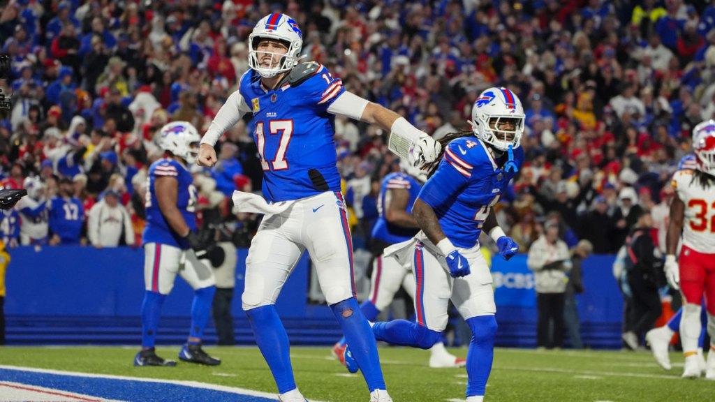 Buffalo Bills quarterback Josh Allen (17) reacts to scoring a touchdown against the Kansas City Chiefs during the second half at Highmark Stadium.