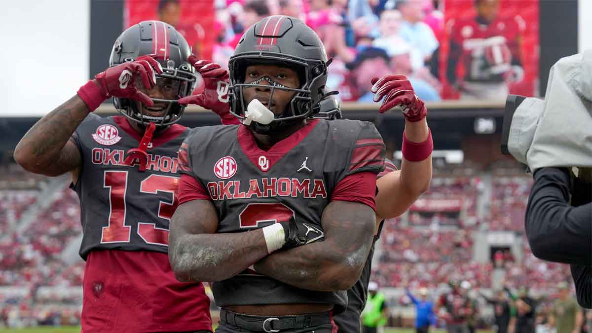 Oklahoma Sooners running back Jovantae Barnes (2) celebrates with Oklahoma Sooners wide receiver J.J. Hester (13) after a touchdown during a college football game between the University of Oklahoma Sooners (OU) and the Maine Black Bears at Gaylord Family - Oklahoma Memorial Stadium in Norman, Okla., Saturday, Nov. 2, 2024.