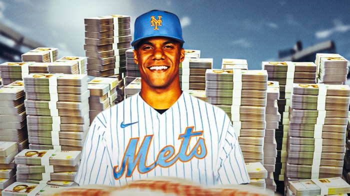 Juan Soto surrounded by piles of cash.