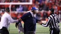 BYU football head coach Kalani Sitake reacts after a call for the Utah Utes during the fourth quarter at Rice-Eccles Stadium.