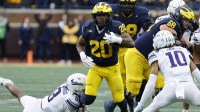 Michigan Wolverines running back Kalel Mullings (20) runs the ball against the Northwestern Wildcats in the first half at Michigan Stadium.