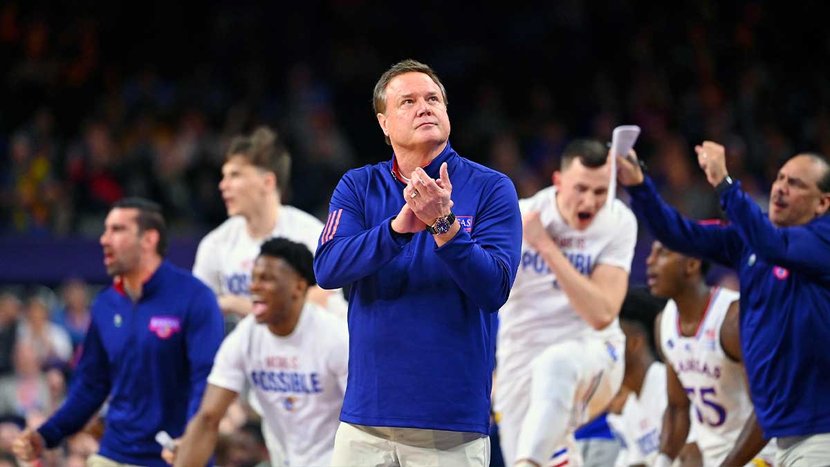 https://wp.clutchpoints.com/wp-content/uploads/2024/11/Kansas-Basketball-coach-Bill-Self-on-the-sidelines.jpg