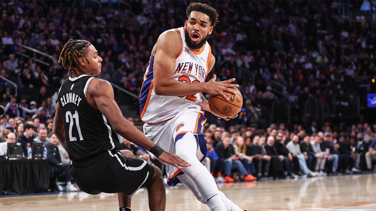 New York Knicks center Karl-Anthony Towns (32) collides with Brooklyn Nets forward Noah Clowney (21) in the third quarter at Madison Square Garden.