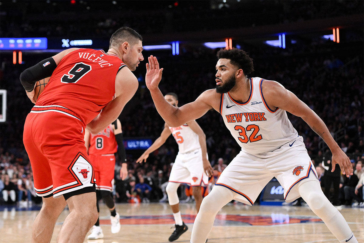 Chicago Bulls center Nikola Vucevic (9) looks for an opening as New York Knicks center Karl-Anthony Towns (32) defends during the second half at Madison Square Garden. 