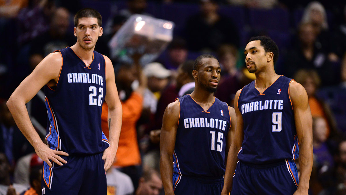 Charlotte Bobcats center Byron Mullens (22), point guard Kemba Walker (15) and shooting guard Gerald Henderson (9) against the Phoenix Suns at the US Airways Center. The Suns defeated the Bobcats 121-104.