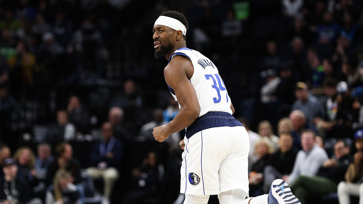 Dallas Mavericks guard Kemba Walker (34) reacts to his shot against the Minnesota Timberwolves during the second period at Target Center.