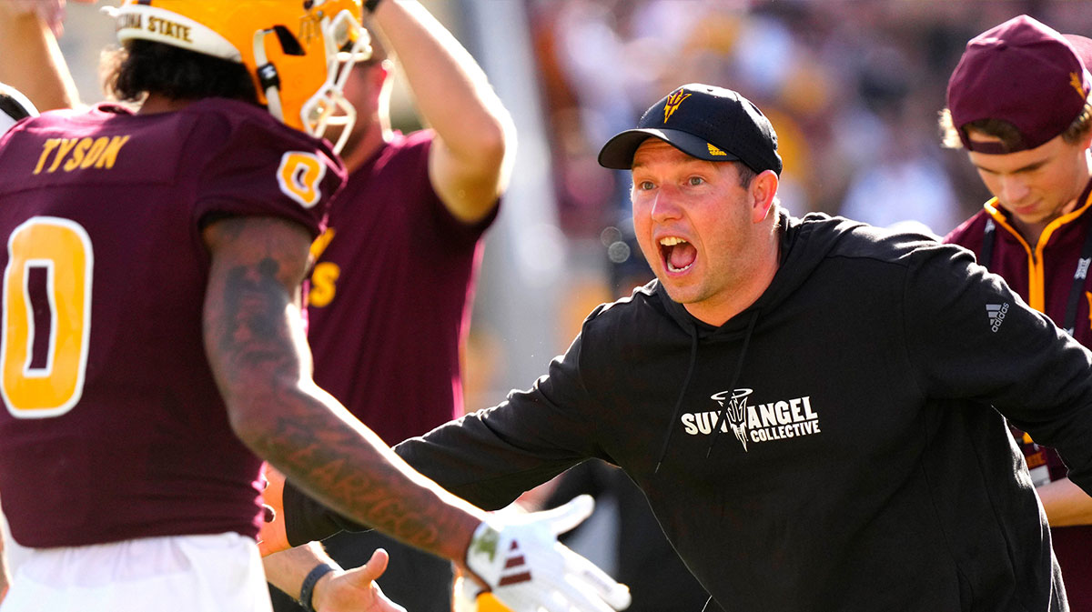 Arizona State head football coach Kenny Dillingham celebrates with Arizona State wide receiver Jordyn Tyson (0) after a touchdown drive against BYU during the first half at Mountain America Stadium in Tempe on Nov. 23, 2024.