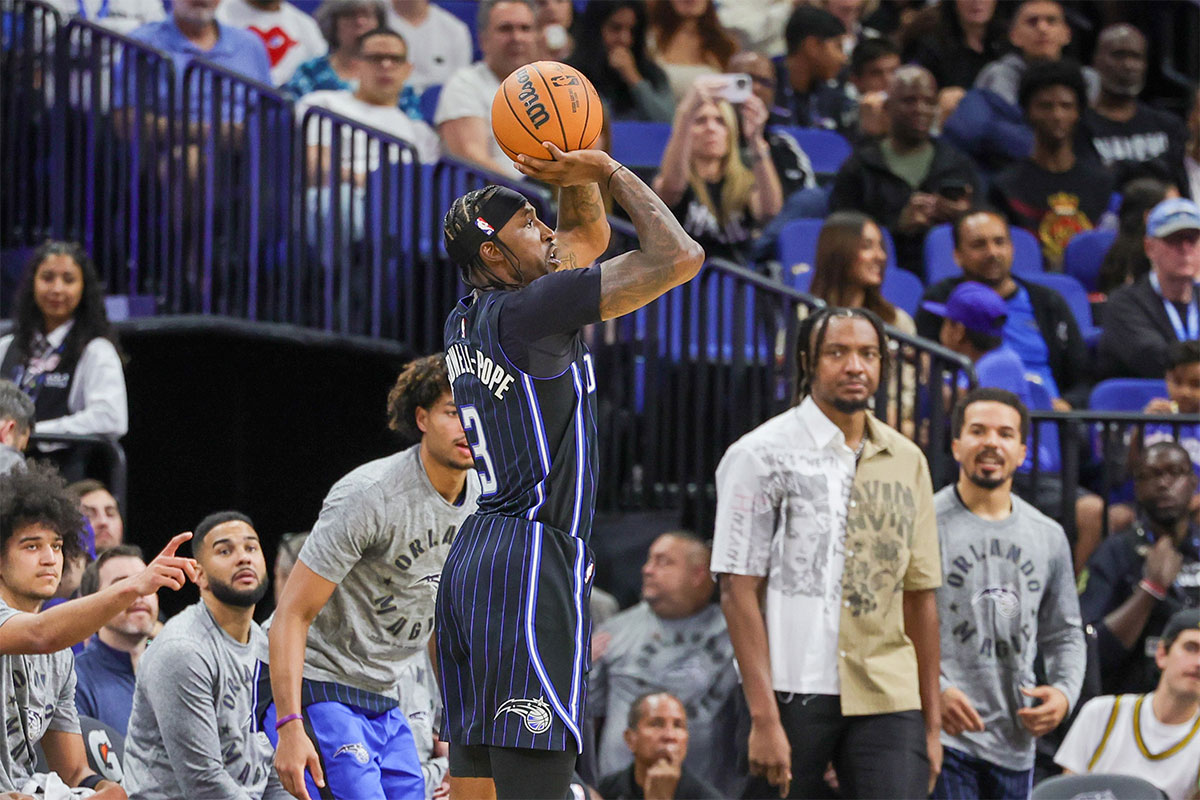 Orlando Magic guard Kentavious Caldwell-Pope (3) shoots a three point basket during the second quarter against the Washington Wizards at Kia Center.