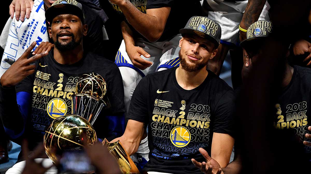 Gold state warriors forward Kevin Durant (35) and preserve Stephen Curri (30) after the beating Cliveland Cavaliers in the game four of 2018 NBA finals on accelerated credit arenas. 