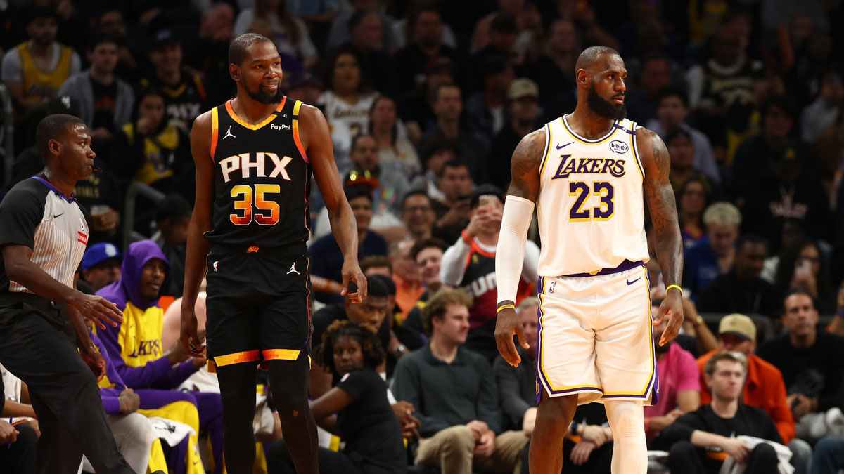 Los Angeles Lakers forward LeBron James (23) against Phoenix Suns forward Kevin Durant (35) during an NBA Cup game at Footprint Center. 