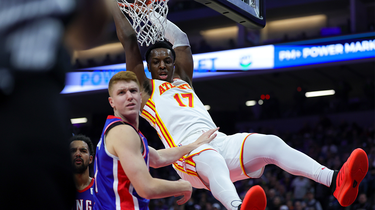 Atlanta Hawks forward Onyeka Okongwu (17) dunks the ball against Sacramento Kings guard Kevin Huerter (9) during the second quarter at Golden 1 Center.