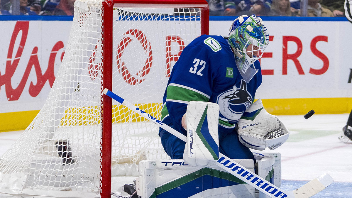 Vancouver Canucks goalie Kevin Lankinen (32) makes a save against the New York Islanders during the second period at Rogers Arena.