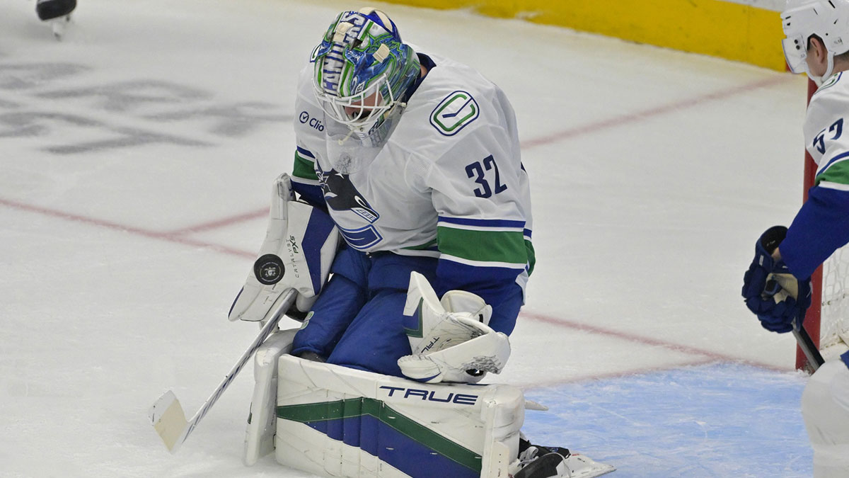 Vancouver Canucks goalie Kevin Lankinen (32) makes a save in the first period against the Anaheim Ducks at Honda Center.