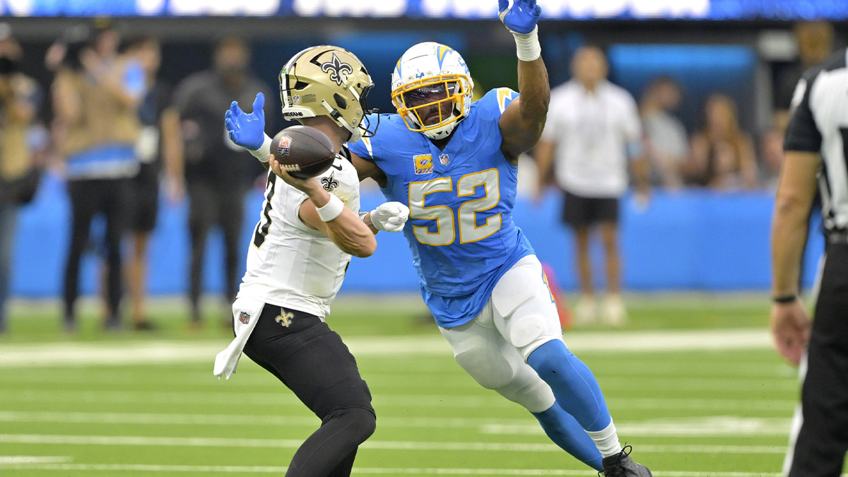 Oct 27, 2024; Inglewood, California, USA; Los Angeles Chargers linebacker Khalil Mack (52) forces New Orleans Saints quarterback Jake Haener (3) to throw an incomplete pass in the second half at SoFi Stadium. 