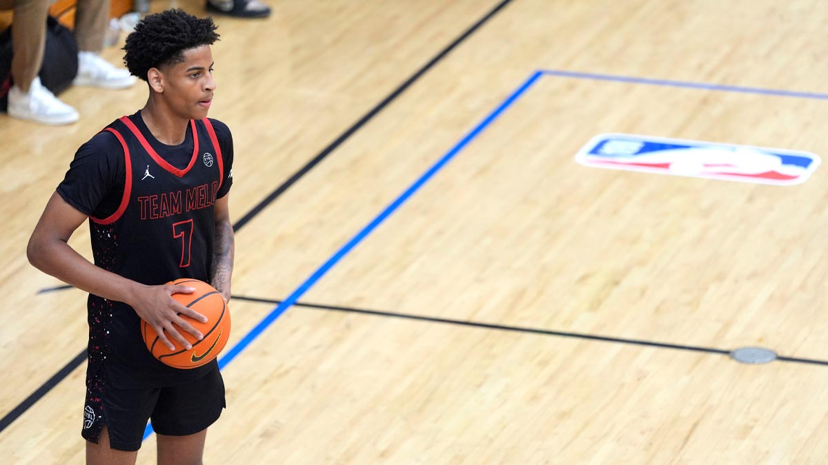 Team Melo's Kiyan Anthony (7), son of NBA star Carmelo Anthony, looks to pass during the Team Melo and Georgia Stars game at the Nike Peach Jam at Riverview Park Activities Center. The Georgia Stars won 64-63. 