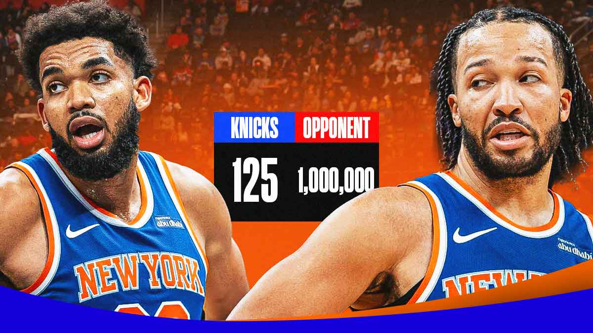 Knicks Karl-Anthony Towns and Jalen Brunson in front of a lopsided scoreboard