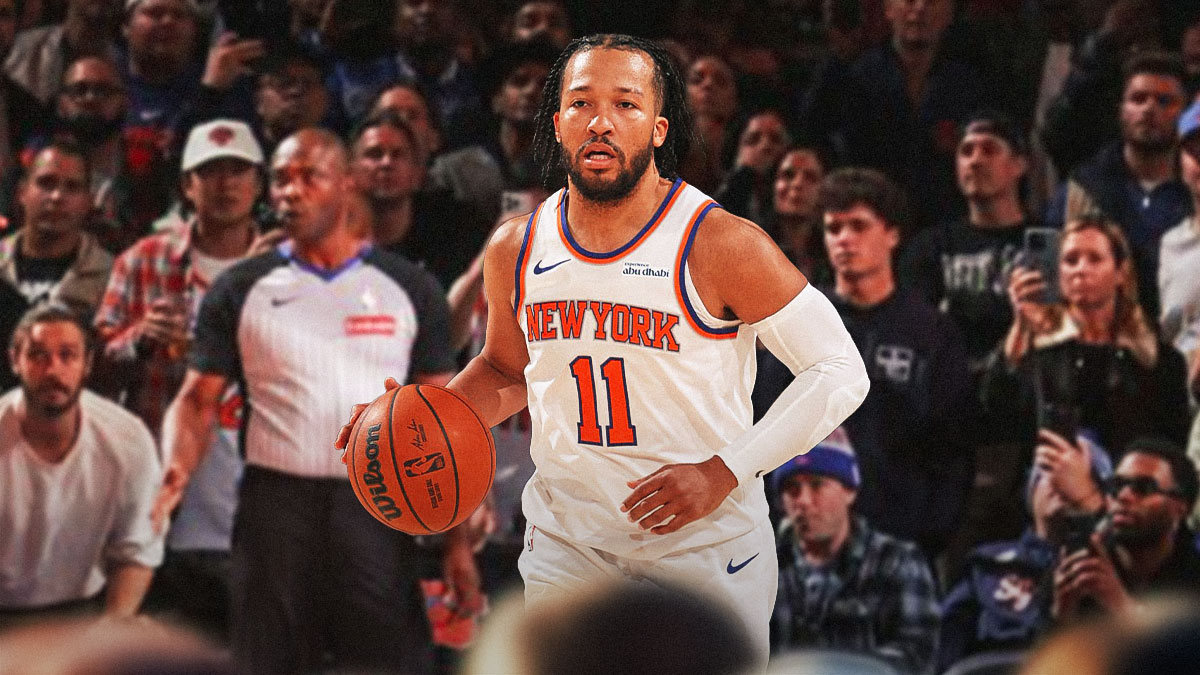 Jalen Brunson in Knicks gear handling the ball.