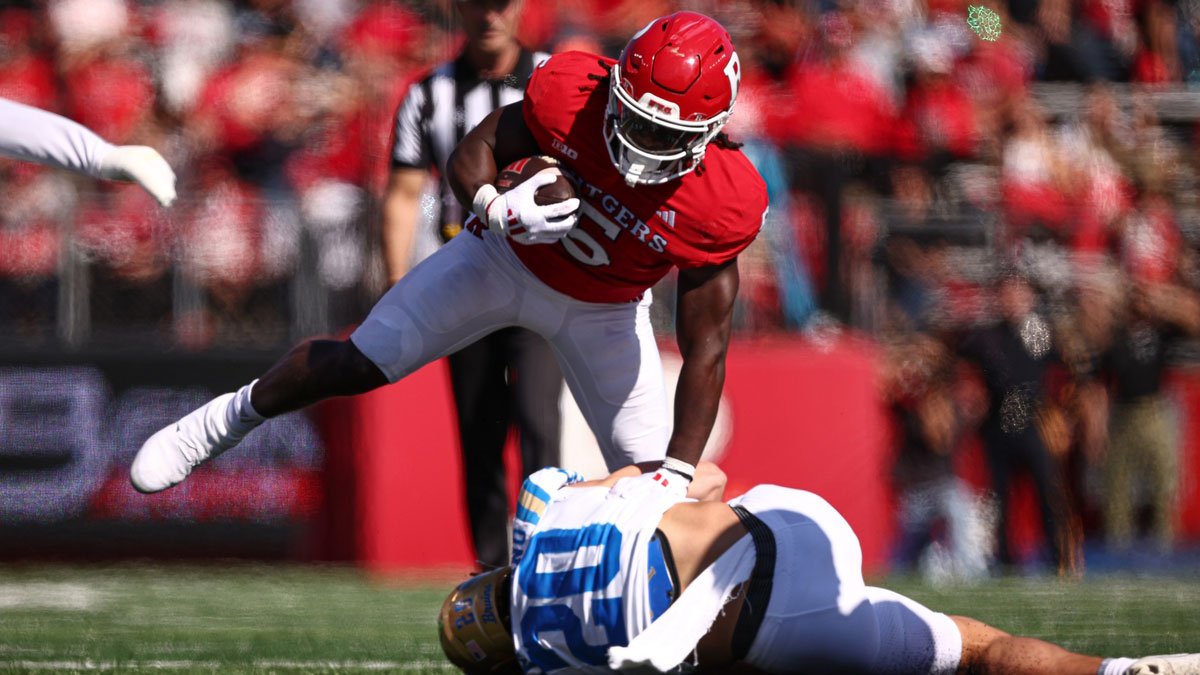 Oct 19, 2024; Piscataway, New Jersey, USA; Rutgers Scarlet Knights running back Kyle Monangai (5) fights for yards as UCLA Bruins linebacker Kain Medrano (20) tackles at SHI Stadium.