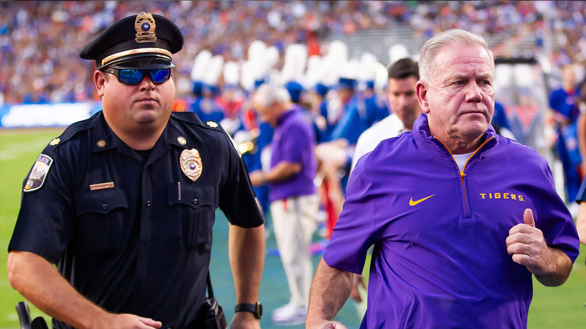 LSU Tigers head coach Brian Kelly runs off the field after the first half at Ben Hill Griffin Stadium in Gainesville, FL on Saturday, November 16, 2024.