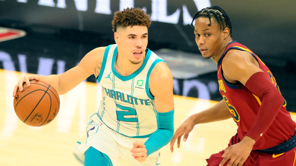 Charlotte Hornets guard LaMelo Ball (2) moves the ball against Cleveland Cavaliers guard Isaac Okoro (35) in the first quarter at Rocket Mortgage FieldHouse.