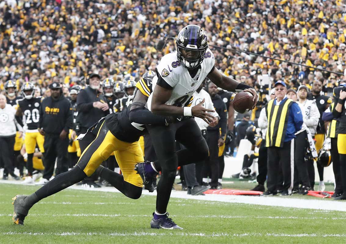 Pittsburgh Steelers cornerback Joey Porter Jr. (24) stops Baltimore Ravens quarterback Lamar Jackson (8) short of the end-zone on a two point conversion attempt during the fourth quarter at Acrisure Stadium. 