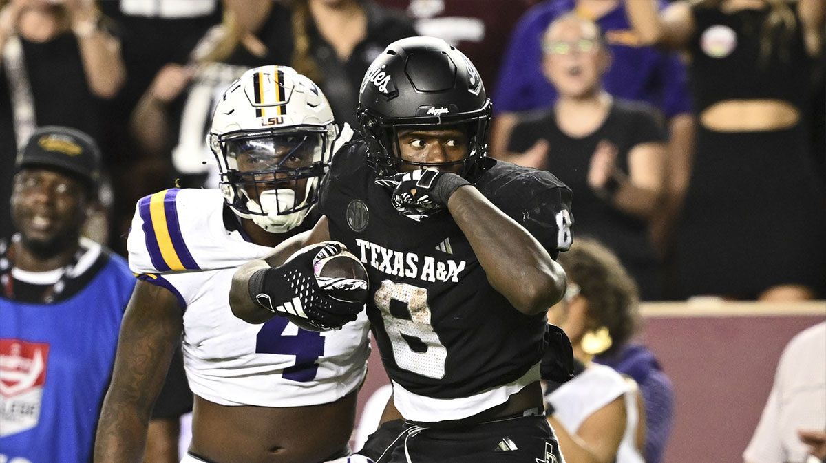 Texas A&M Aggies running back Le'Veon Moss (8) reacts against the LSU Tigers during the third quarter. The Aggies defeated the Tigers 38-23; at Kyle Field.